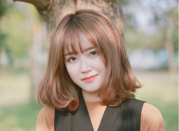 tóc ngắn uốn cụp ngang vai
