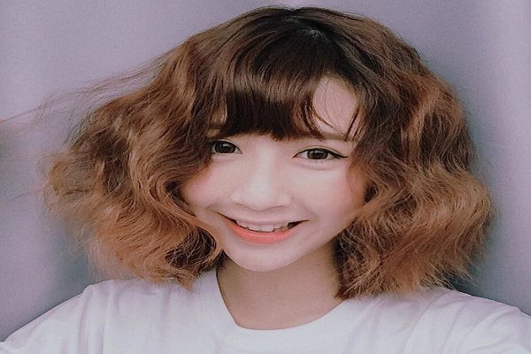 tóc ngắn xoăn dập phồng