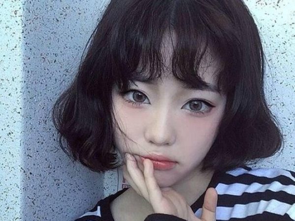 tóc bob xoăn ngắn mặt tròn