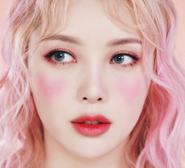 tóc xoăn nhuộm cam pastel
