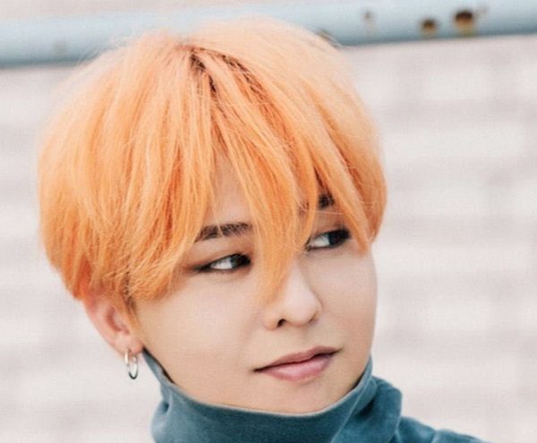 màu tóc đẹp cho nam da ngăm - cam vàng G Dragon