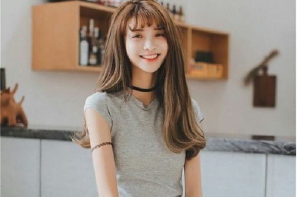 tóc dài uốn đuôi trẻ trung