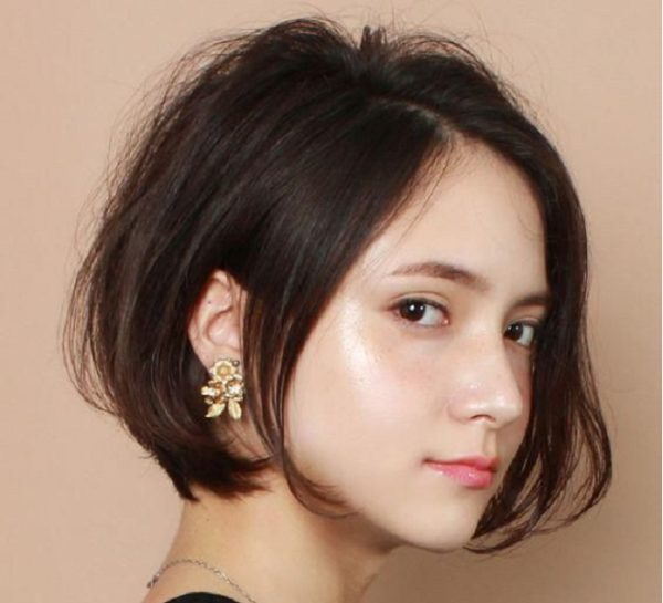 tóc ngắn uốn cho mặt dài mái lệch cúp đuôi