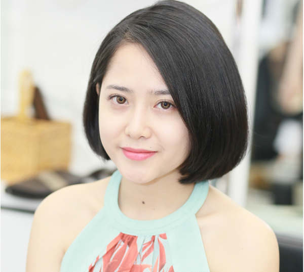 tóc uốn cụp đuôi cho mặt tròn