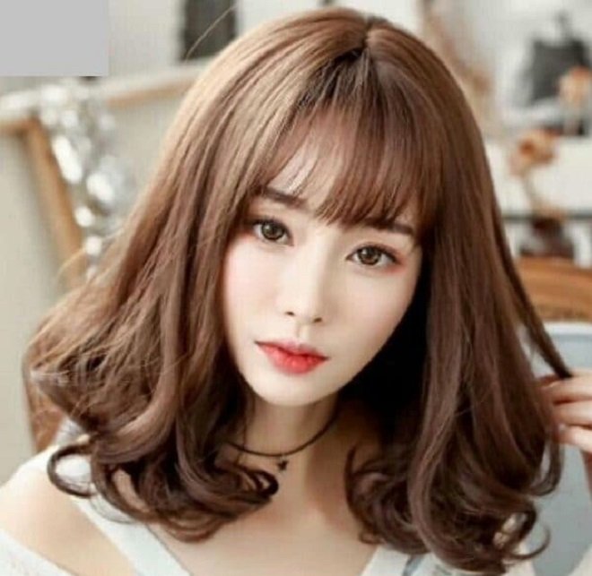 Tóc ngang uốn xoăn đuôi