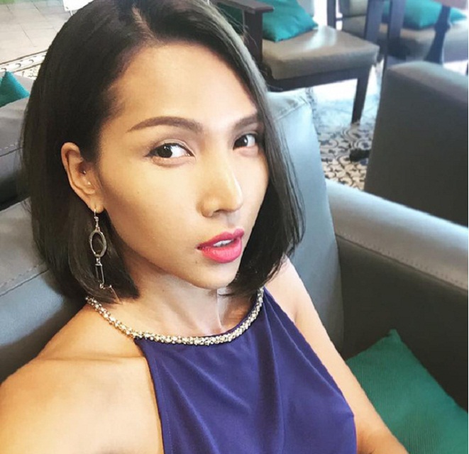 Minh Triệu trong kiểu tóc ngắn thẳng đơn giản